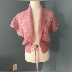 Pink acrylic shrug